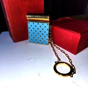 Valentino Garavani rockstuded compact.